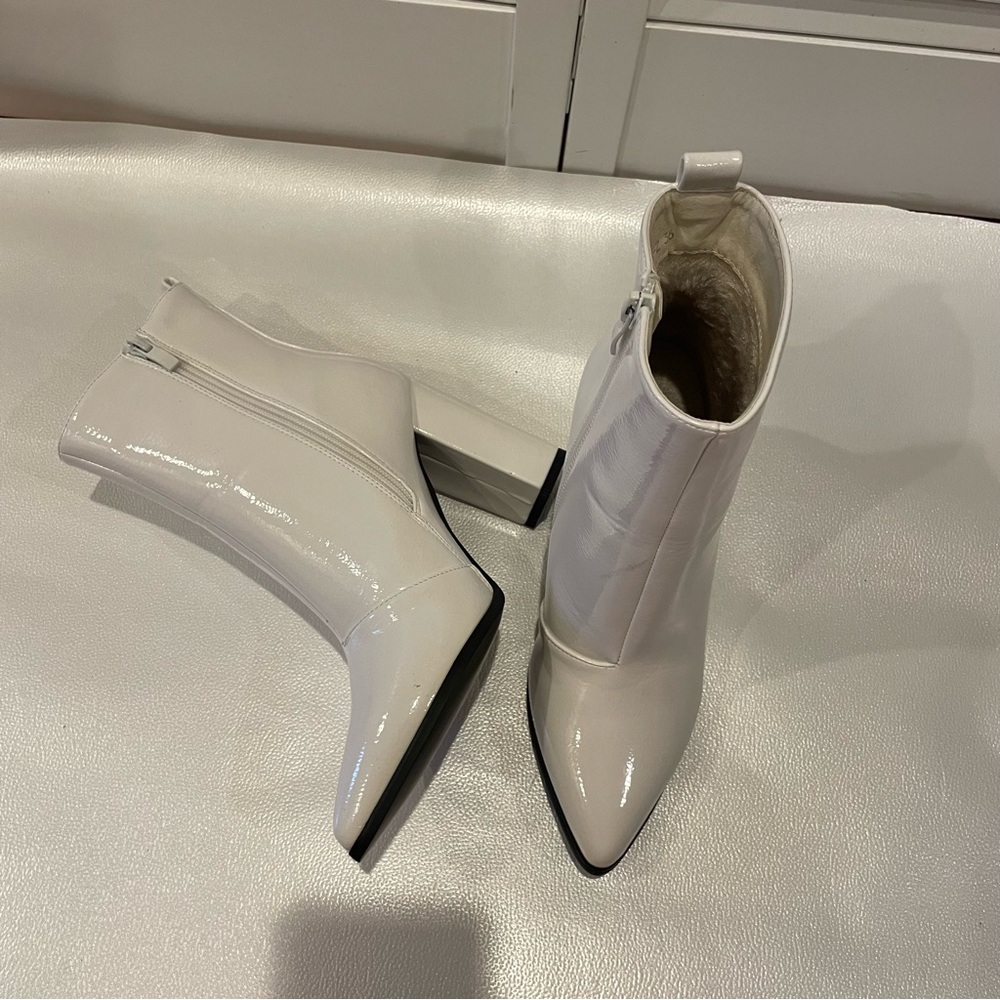 Sleek White Ankle Booties with Pointed Toe and High Heel